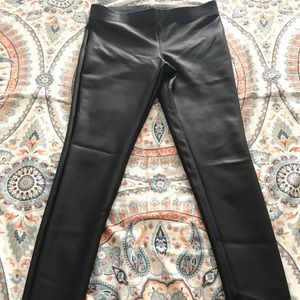 Leather leggings.